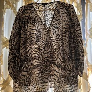 Beautiful plus size black and white blouse.